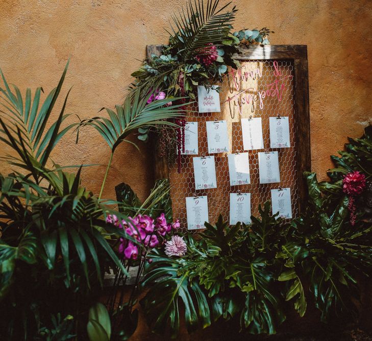 Chicken Wire Table Plan | Tropical Green & Fuchsia Pink Outdoor Wedding at Castellina de Miremont, Italy Planned & Styled by Come le Ciliegie Wedding & Events | Images by Effeanfotografie | Film by Headshot Weddings