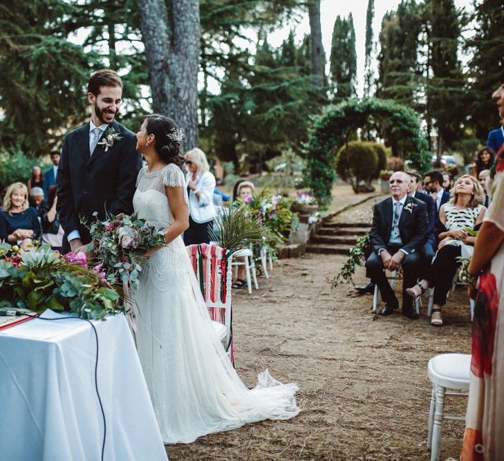 Outdoor Wedding Ceremony | Bride in Jenny Packham Dolly Bridal Gown | Tropical Green & Fuchsia Pink Wedding at Castellina de Miremont, Italy Planned & Styled by Come le Ciliegie Wedding & Events | Images by Effeanfotografie | Film by Headshot Weddings