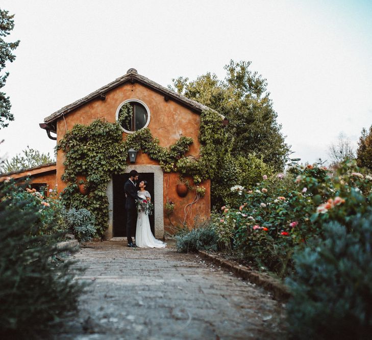 Bride in Jenny Packham Dolly Bridal Gown | Groom in Four Stroke Suit | Tropical Green & Fuchsia Pink Outdoor Wedding at Castellina de Miremont, Italy Planned & Styled by Come le Ciliegie Wedding & Events | Images by Effeanfotografie | Film by Headshot Weddings