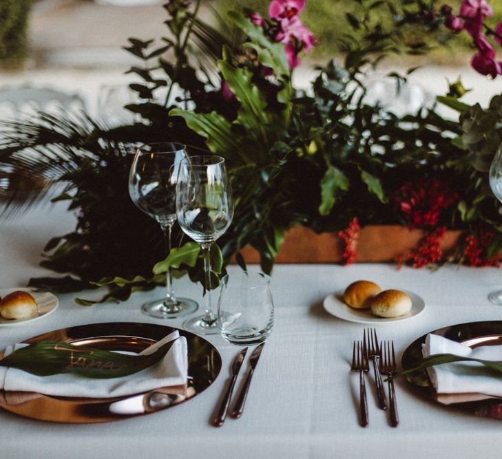 Place Setting | Tropical Green & Fuchsia Pink Outdoor Wedding at Castellina de Miremont, Italy Planned & Styled by Come le Ciliegie Wedding & Events | Images by Effeanfotografie | Film by Headshot Weddings