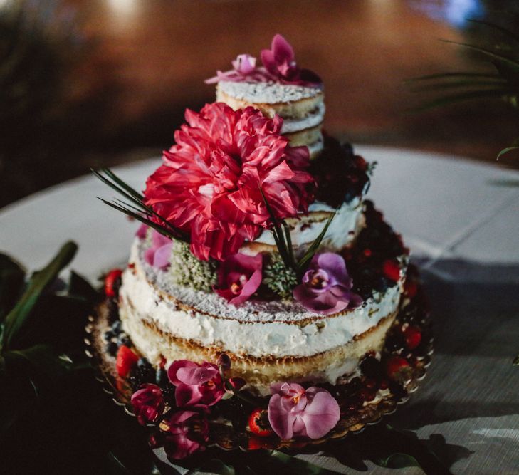 Semi Naked Wedding Cake with Floral Decor | Tropical Green & Fuchsia Pink Outdoor Wedding at Castellina de Miremont, Italy Planned & Styled by Come le Ciliegie Wedding & Events | Images by Effeanfotografie | Film by Headshot Weddings