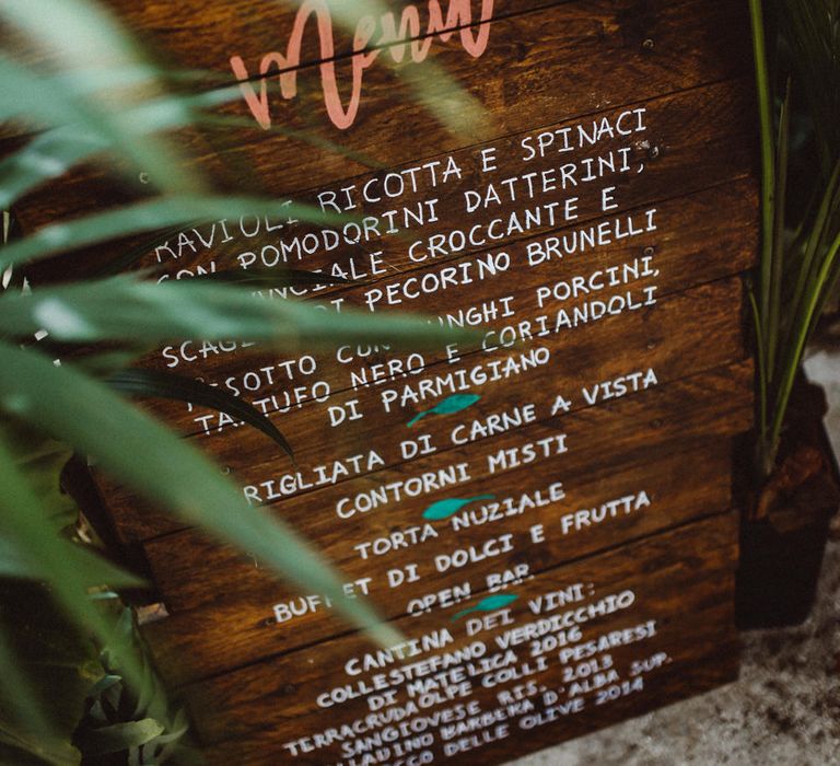 Wooden Menu Board | Tropical Green & Fuchsia Pink Outdoor Wedding at Castellina de Miremont, Italy Planned & Styled by Come le Ciliegie Wedding & Events | Images by Effeanfotografie | Film by Headshot Weddings