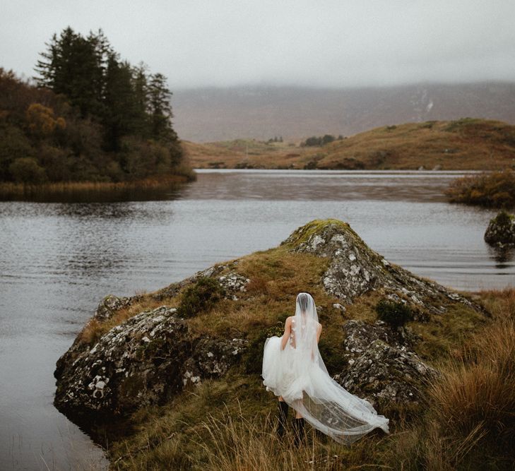 Kaviar Gauche Wedding Dress For A Candlelit Wedding | Connemara Ireland | James Frost Photography