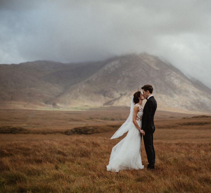 Kaviar Gauche Wedding Dress For A Candlelit Wedding | Connemara Ireland | James Frost Photography