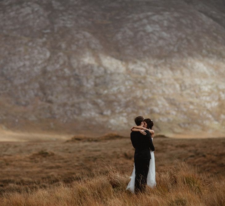 Kaviar Gauche Wedding Dress For A Candlelit Wedding | Connemara Ireland | James Frost Photography