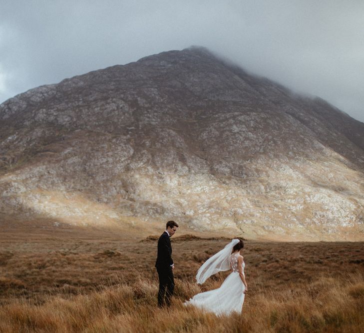 Kaviar Gauche Wedding Dress For A Candlelit Wedding | Connemara Ireland | James Frost Photography