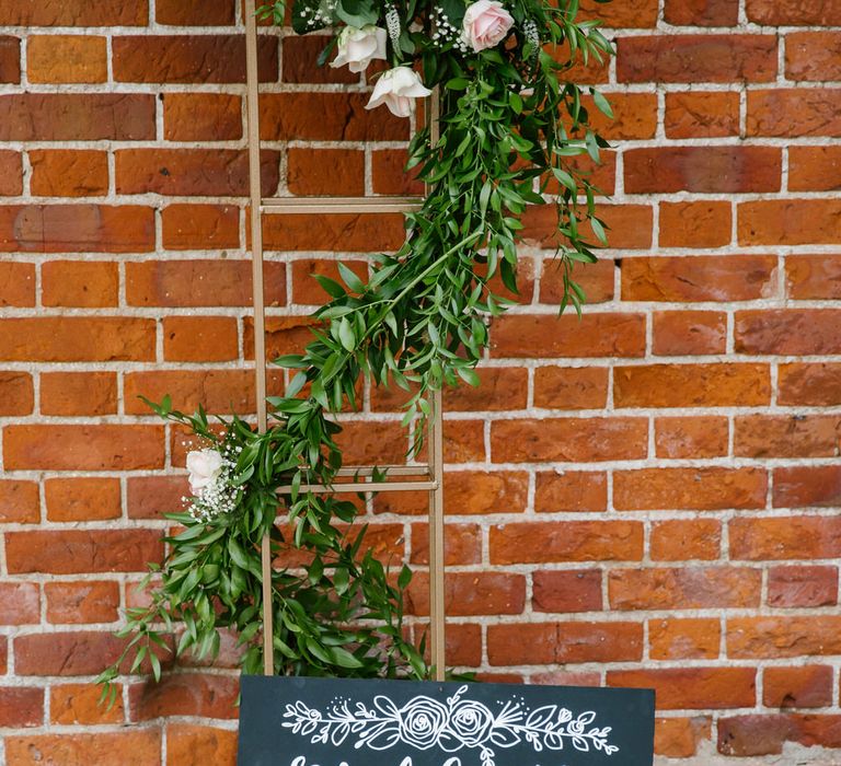 DIY Photobooth At Wedding With Floral Arch