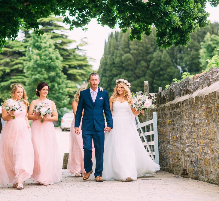 Bride in Mori Lee Wedding Dress | Bridesmaids in Pink For Her and For Him Dresses