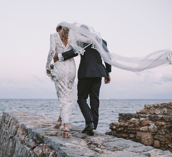 Bride in Yolan Cris Lace Wedding Dress | Groom in Corvus Barcelona Suit | Sara Frost Photography | AMS Love in Video