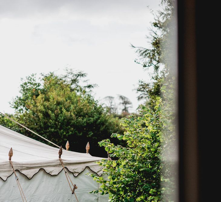 Marquee From LPM Bohemia // Embellished Jenny Packham Gown Marquee Wedding At Coombeshead Farm Cornwall The Garden Gate Flower Co Planning Jenny Wren Events Images Barney Walters Photography