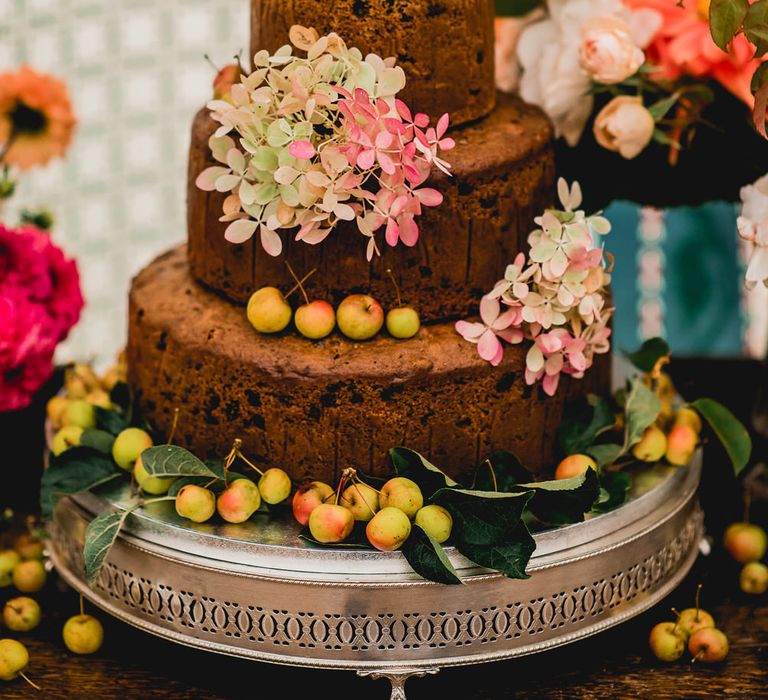 Rustic Wedding Cake With Fresh Fruit And Flowers // Seasonal Wedding Flowers By The Garden Gate Flower Company // Floral Lined Marquee For Wedding // Embellished Jenny Packham Gown Marquee Wedding At Coombeshead Farm Cornwall The Garden Gate Flower Co Planning Jenny Wren Events Images Barney Walters Photography