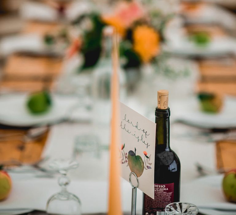 Rustic Wedding Decor For Wooden Trestle Tables / Floral Lined Marquee For Wedding // Embellished Jenny Packham Gown Marquee Wedding At Coombeshead Farm Cornwall The Garden Gate Flower Co Planning Jenny Wren Events Images Barney Walters Photography