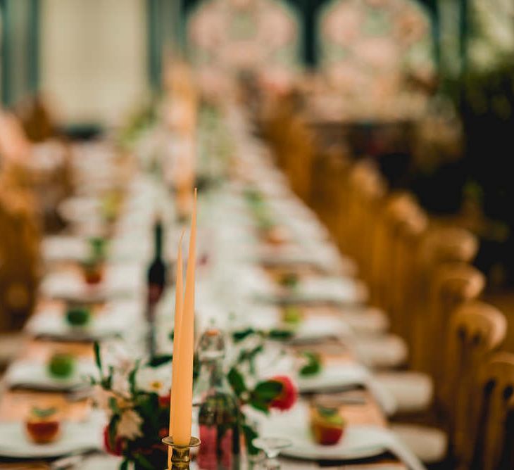 Rustic Wedding Decor For Wooden Trestle Tables / Floral Lined Marquee For Wedding // Embellished Jenny Packham Gown Marquee Wedding At Coombeshead Farm Cornwall The Garden Gate Flower Co Planning Jenny Wren Events Images Barney Walters Photography