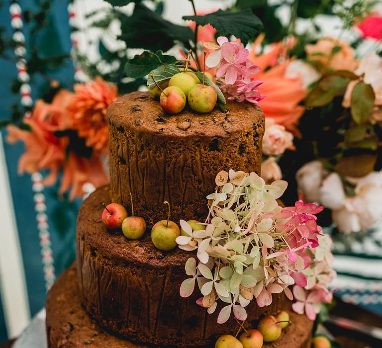 Rustic Wedding Cake With Fresh Fruit And Flowers // Seasonal Wedding Flowers By The Garden Gate Flower Company // Floral Lined Marquee For Wedding // Embellished Jenny Packham Gown Marquee Wedding At Coombeshead Farm Cornwall The Garden Gate Flower Co Planning Jenny Wren Events Images Barney Walters Photography