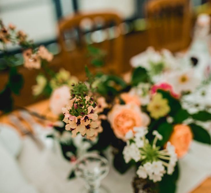 Seasonal Wedding Flowers By The Garden Gate Flower Company // Floral Lined Marquee For Wedding // Embellished Jenny Packham Gown Marquee Wedding At Coombeshead Farm Cornwall The Garden Gate Flower Co Planning Jenny Wren Events Images Barney Walters Photography