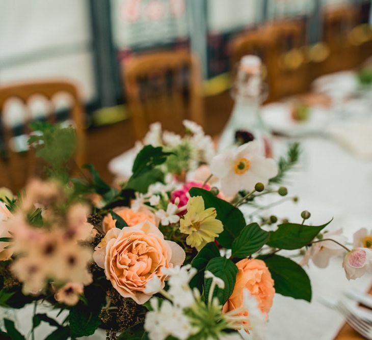 Seasonal Wedding Flowers By The Garden Gate Flower Company // Floral Lined Marquee For Wedding // Embellished Jenny Packham Gown Marquee Wedding At Coombeshead Farm Cornwall The Garden Gate Flower Co Planning Jenny Wren Events Images Barney Walters Photography