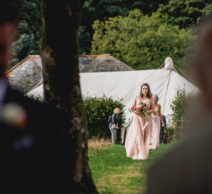 Tree Copse Wedding Ceremony With Hay Bale Seating // Farm Wedding Venue Cornwall // Embellished Jenny Packham Gown Marquee Wedding At Coombeshead Farm Cornwall The Garden Gate Flower Co Planning Jenny Wren Events Images Barney Walters Photography