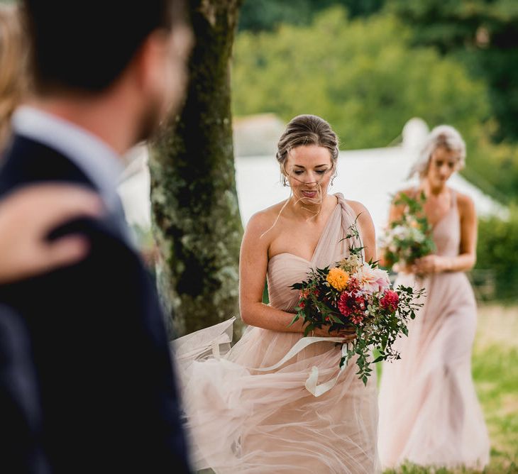 Tree Copse Wedding Ceremony With Hay Bale Seating // Farm Wedding Venue Cornwall // Embellished Jenny Packham Gown Marquee Wedding At Coombeshead Farm Cornwall The Garden Gate Flower Co Planning Jenny Wren Events Images Barney Walters Photography