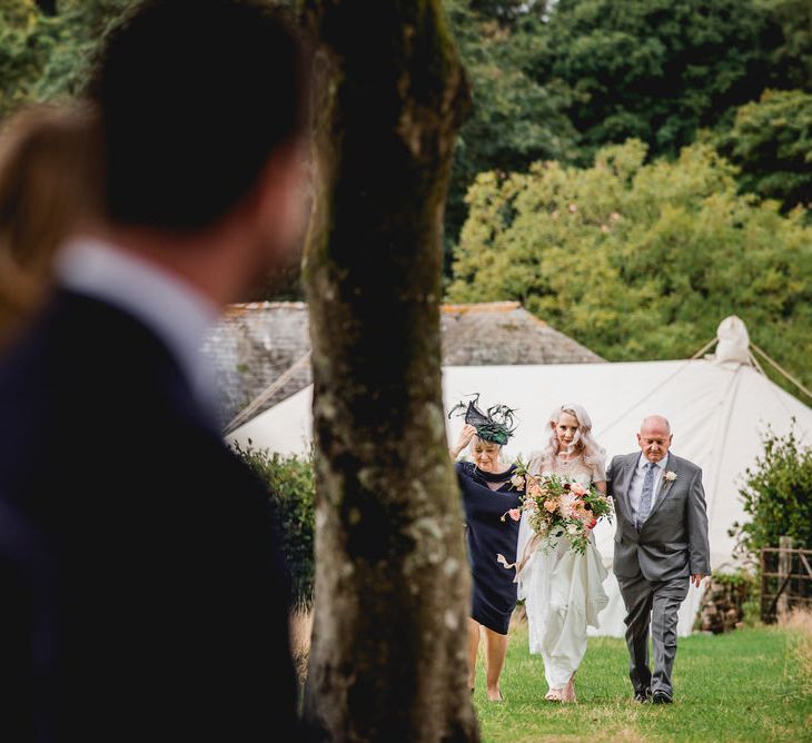 Tree Copse Wedding Ceremony With Hay Bale Seating // Farm Wedding Venue Cornwall // Embellished Jenny Packham Gown Marquee Wedding At Coombeshead Farm Cornwall The Garden Gate Flower Co Planning Jenny Wren Events Images Barney Walters Photography