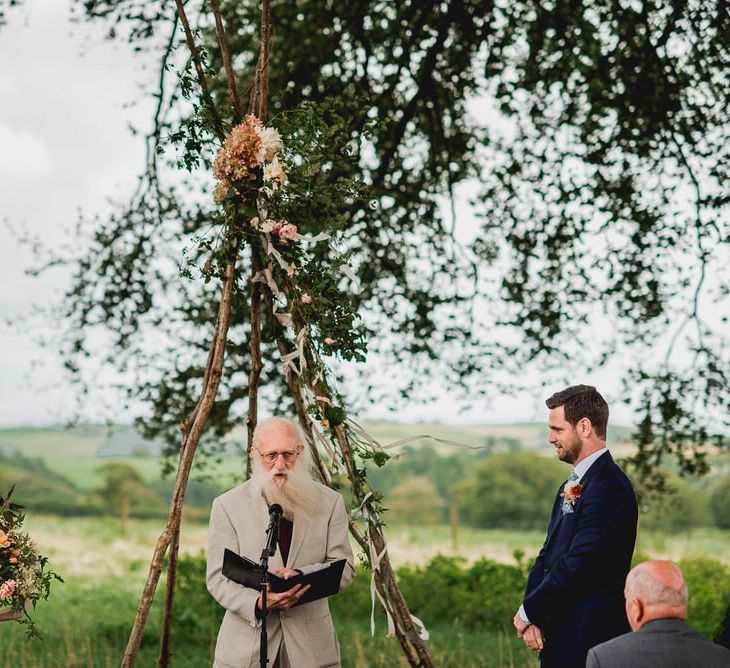 Tree Copse Wedding Ceremony With Hay Bale Seating // Farm Wedding Venue Cornwall // Embellished Jenny Packham Gown Marquee Wedding At Coombeshead Farm Cornwall The Garden Gate Flower Co Planning Jenny Wren Events Images Barney Walters Photography