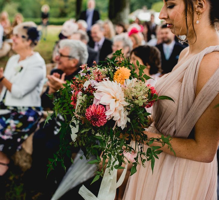 Tree Copse Wedding Ceremony With Hay Bale Seating // Farm Wedding Venue Cornwall // Embellished Jenny Packham Gown Marquee Wedding At Coombeshead Farm Cornwall The Garden Gate Flower Co Planning Jenny Wren Events Images Barney Walters Photography