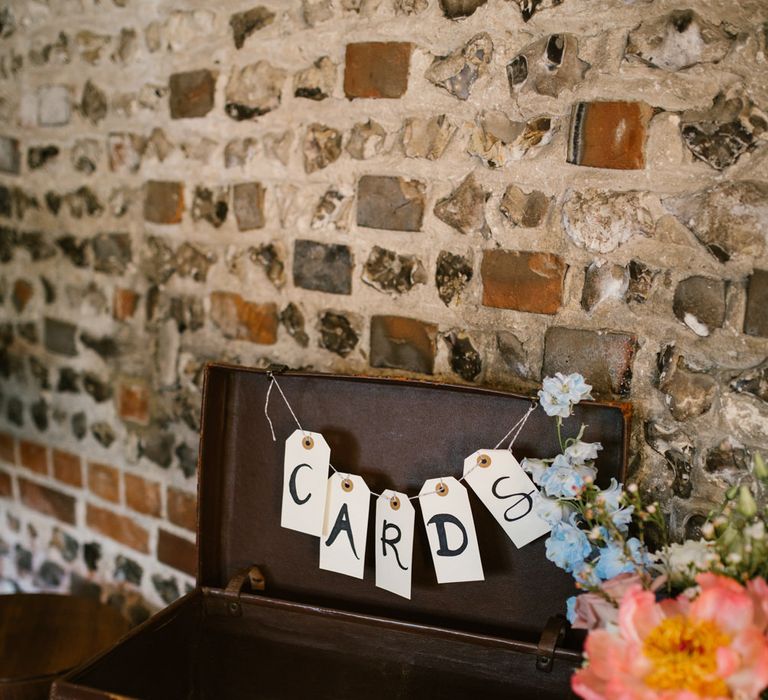 Vintage Suitcase Wedding Decor | DIY Wedding at Upwaltham Barns with Bright Flowers | Danielle Victoria Photography