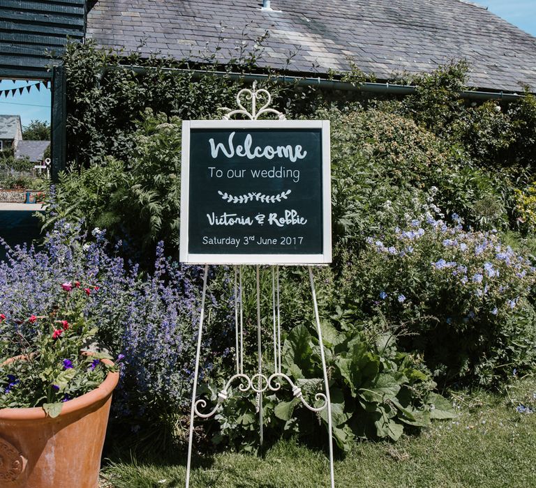 Chalkboard Wedding Sign | DIY Wedding at Upwaltham Barns with Bright Flowers | Danielle Victoria Photography