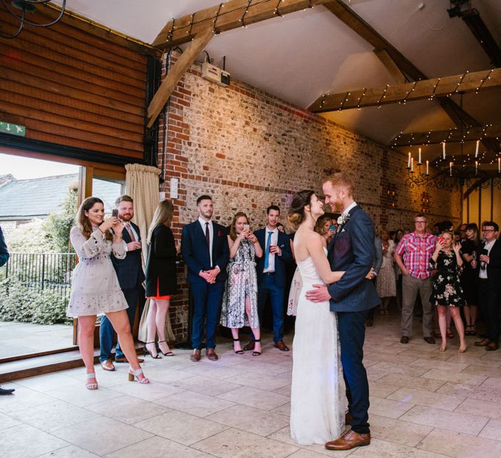 First Dance | Bride in Sarah Seven Gown | Groom in Ted Baker & Next | DIY Wedding at Upwaltham Barns with Bright Flowers | Danielle Victoria Photography