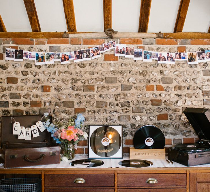 Record Guest book & Vintage Suitcase Card Box Wedding Decor | DIY Wedding at Upwaltham Barns with Bright Flowers | Danielle Victoria Photography