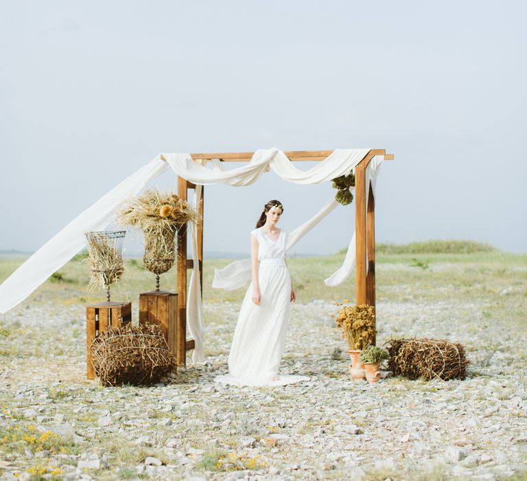 Outdoor Altar | Bride in Alessia Baldi Gown | Cristina Firotto Event Design | Valentina Oprandi Photography