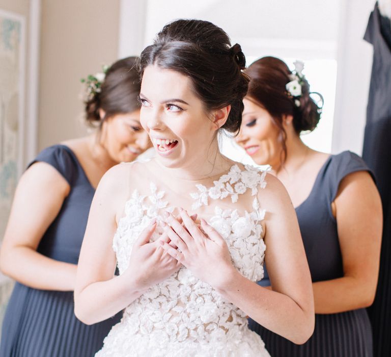 Getting Ready | Bride in Pronovias Gown | Bridesmaids in Grey ASOS Dresses | Bowtie and Belle Photography