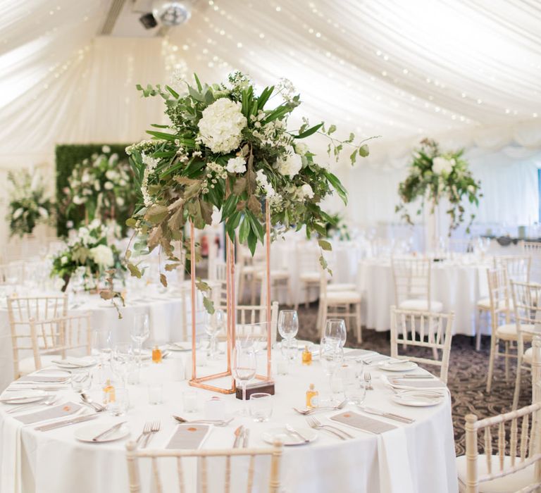 Tall Floral Centrepieces | Greenery & White Marquee Wedding at The Villa, Levens with Copper Details | Bowtie and Belle Photography