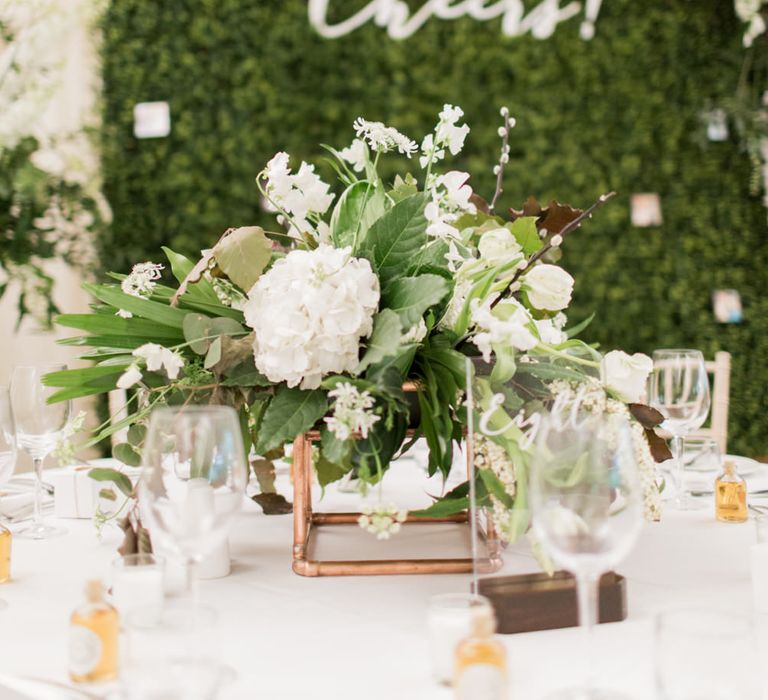 Faux Hedge Backdrop & Floral Centrepiece| Greenery & White Marquee Wedding at The Villa, Levens with Copper Details | Bowtie and Belle Photography