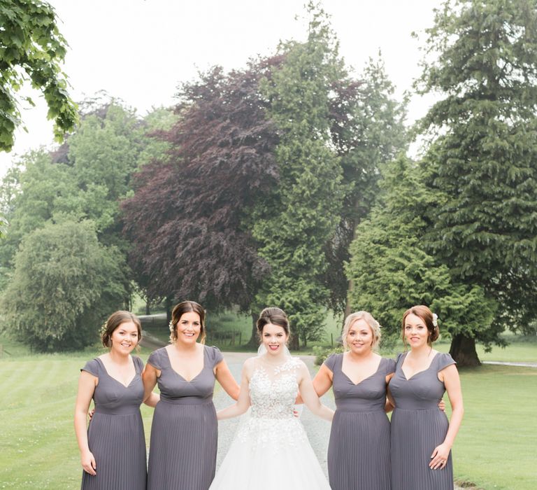 Bridesmaids in Lace Back ASOS Grey Dresses | Greenery & White Marquee Wedding at The Villa, Levens with Copper Details | Bowtie and Belle Photography