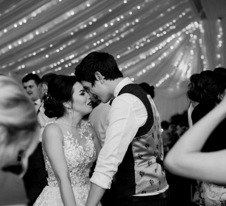 First Dance | Pronovias Taciana Bridal Gown | Groom in Tweed Suit | Greenery & White Marquee Wedding at The Villa, Levens with Copper Details | Bowtie and Belle Photography