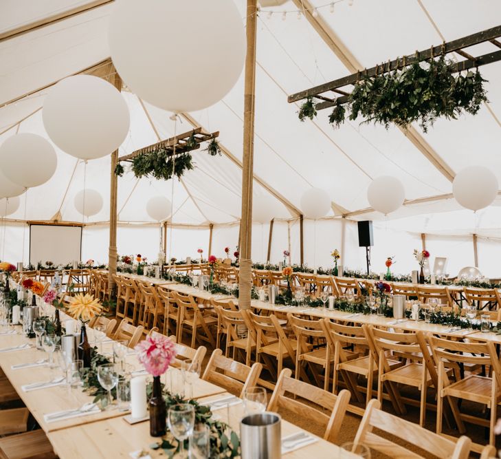 Marquee Wedding | Trestle Tables | Balloons | Hanging Greenery Installations | Andrew Brannan Photography