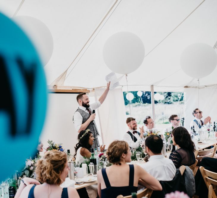 Marquee Wedding | Trestle Tables | Wild Flowers in Jars | Balloons | Hanging Greenery Installations | Andrew Brannan Photography