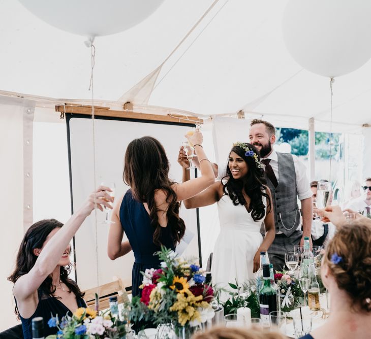 Marquee Wedding | Trestle Tables | Wild Flowers in Jars | Balloons | Hanging Greenery Installations | Andrew Brannan Photography