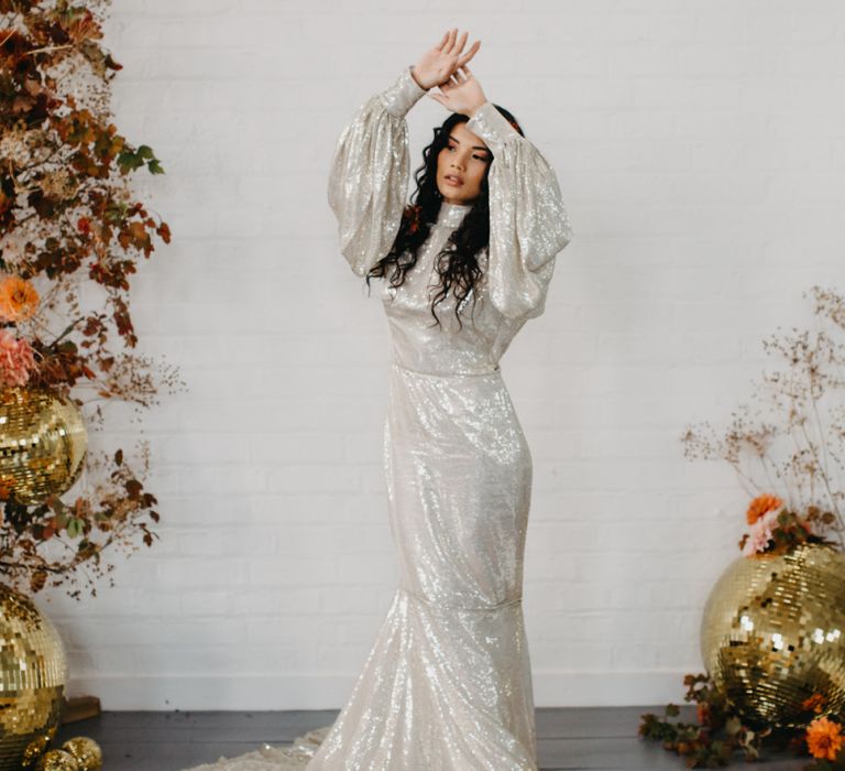 Bride in Silver sequin wedding dress for 70s Disco wedding inspiration