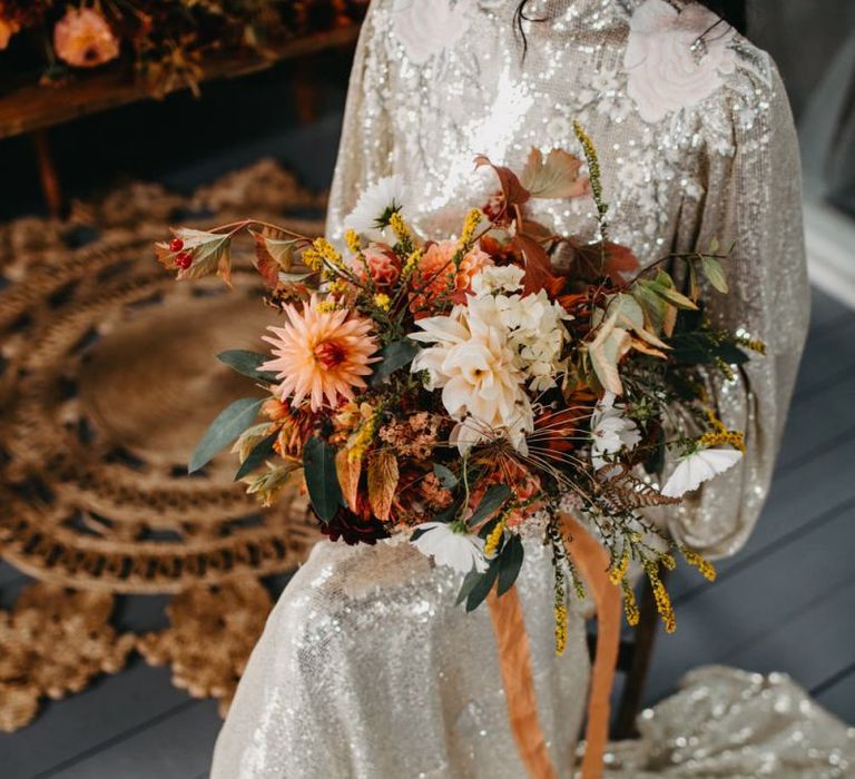 Autumnal wedding bouquet ties with ribbon