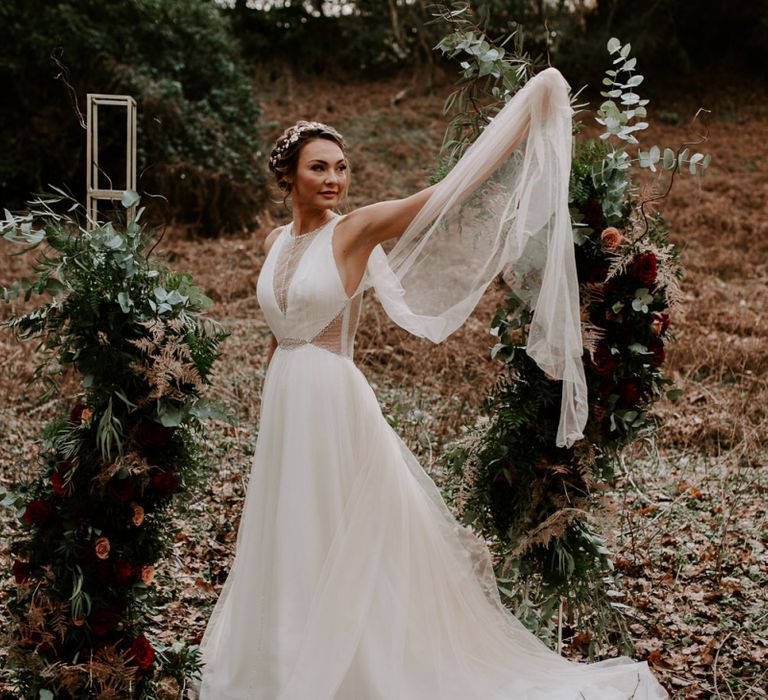 Bohemian Bride in Halterneck Wedding Dress and Veil