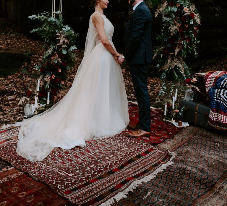 Floral Arch and Persian Rug Altar Wedding Decor