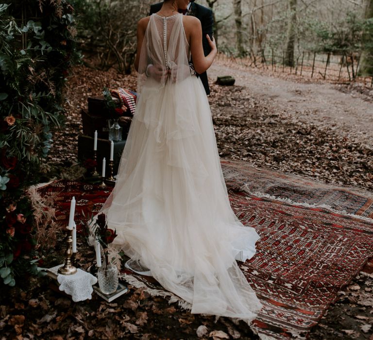 Outdoor Woodland Wedding Ceremony with Persian Rug Altar