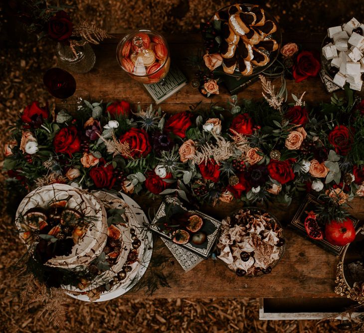 Dessert Table with Floral Garland of Roses and Foliage