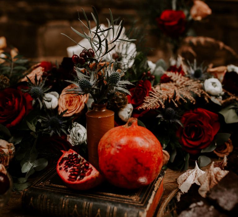 Vintage Book and Flower Stems in In Bottle to Make Bohemian Wedding Decor