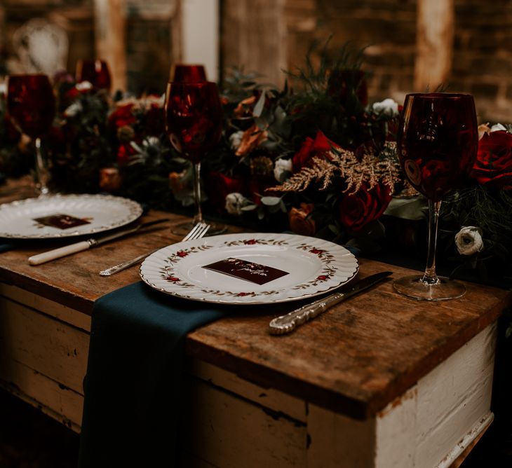 Table Linens, Coloured Goblets and Patterned Tableware for an Elegant Table Place Setting