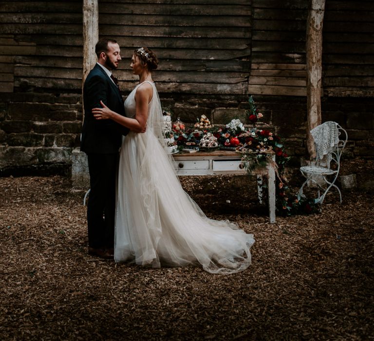 Bride and Groom Portrait at Patrick's Barn with Dessert Table Backdrop