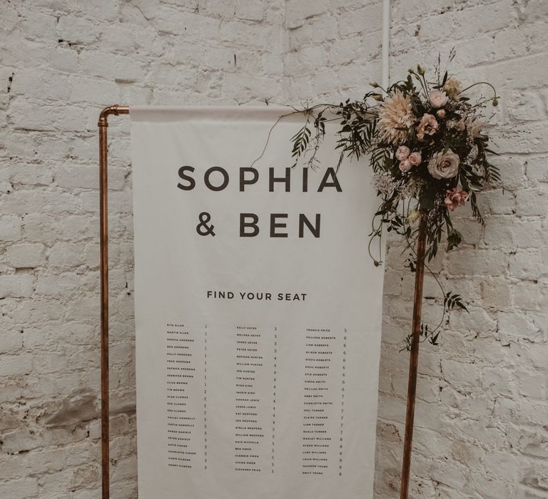 Copper Frame &amp; Flag Table Plan with Floral Decor |  | Romantic Pink and Gold Wedding Inspiration in a Modern Summer House at Garthmyl Hall by KnockKnockPenny Studio | Nesta Lloyd Photography