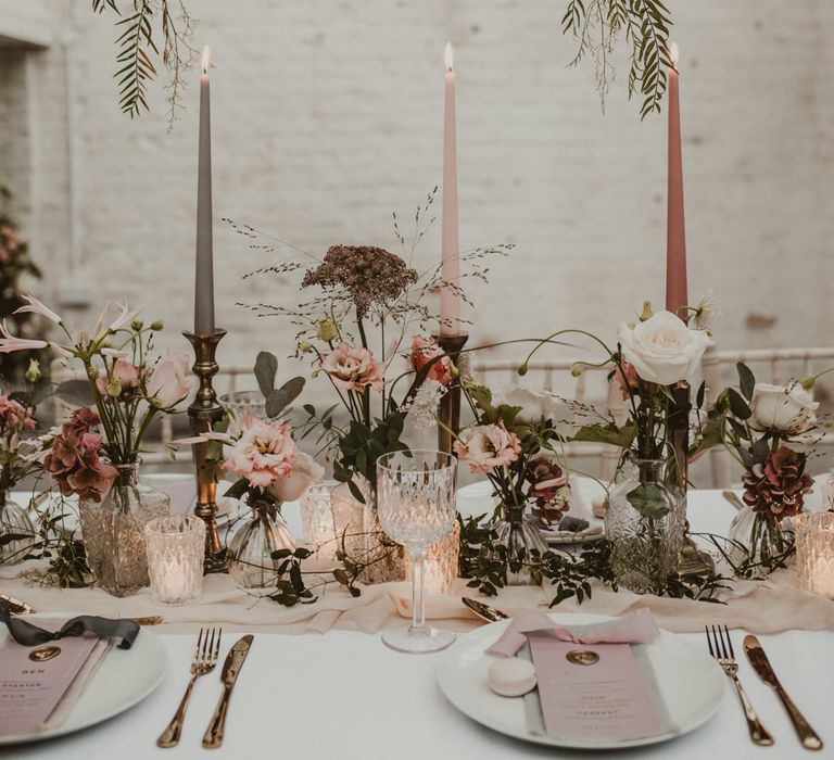 Hanging Floral Installation &amp; Tablescape with Floral Centrepieces &amp; Taper Candles | Romantic Pink and Gold Wedding Inspiration in a Modern Summer House at Garthmyl Hall by KnockKnockPenny Studio | Nesta Lloyd Photography