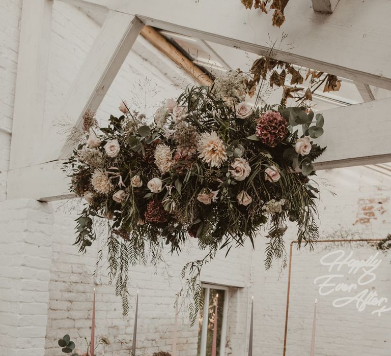 Hanging Floral Installation &amp; Tablescape with Floral Centrepieces &amp; Taper Candles | Romantic Pink and Gold Wedding Inspiration in a Modern Summer House at Garthmyl Hall by KnockKnockPenny Studio | Nesta Lloyd Photography